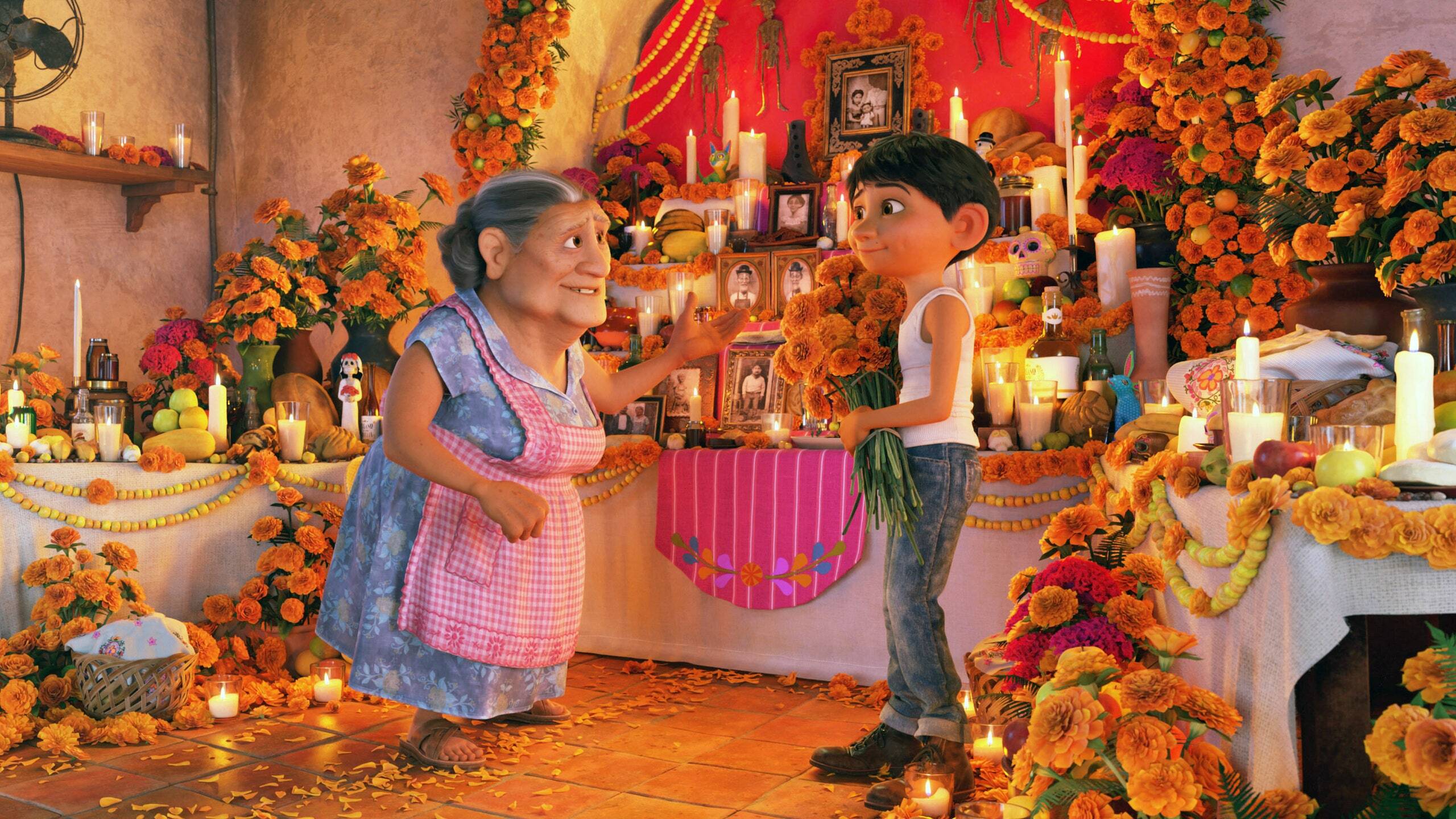 Miguel and Abuelita celebrating Día de los muertos.