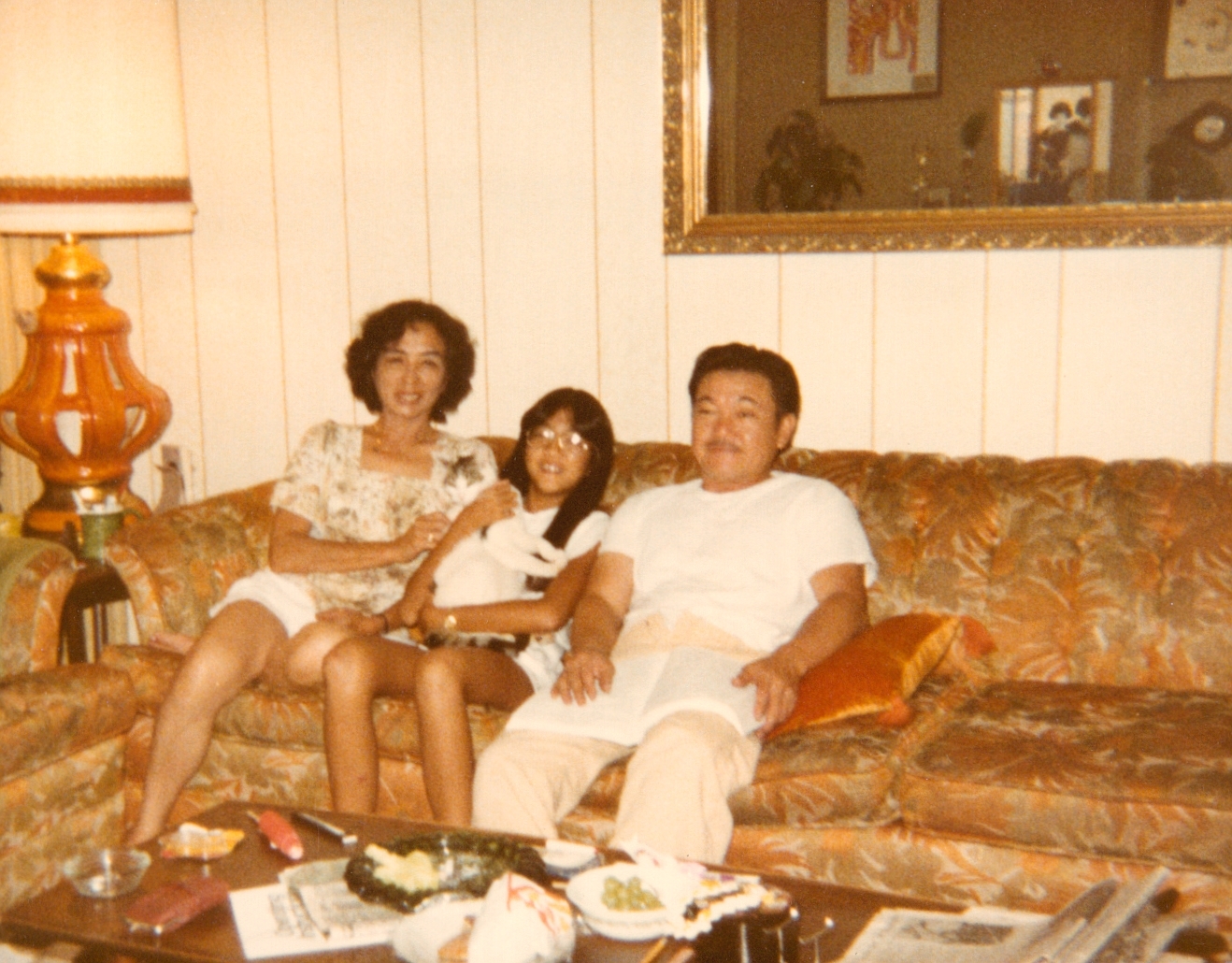 Vicki as a child with her parents.